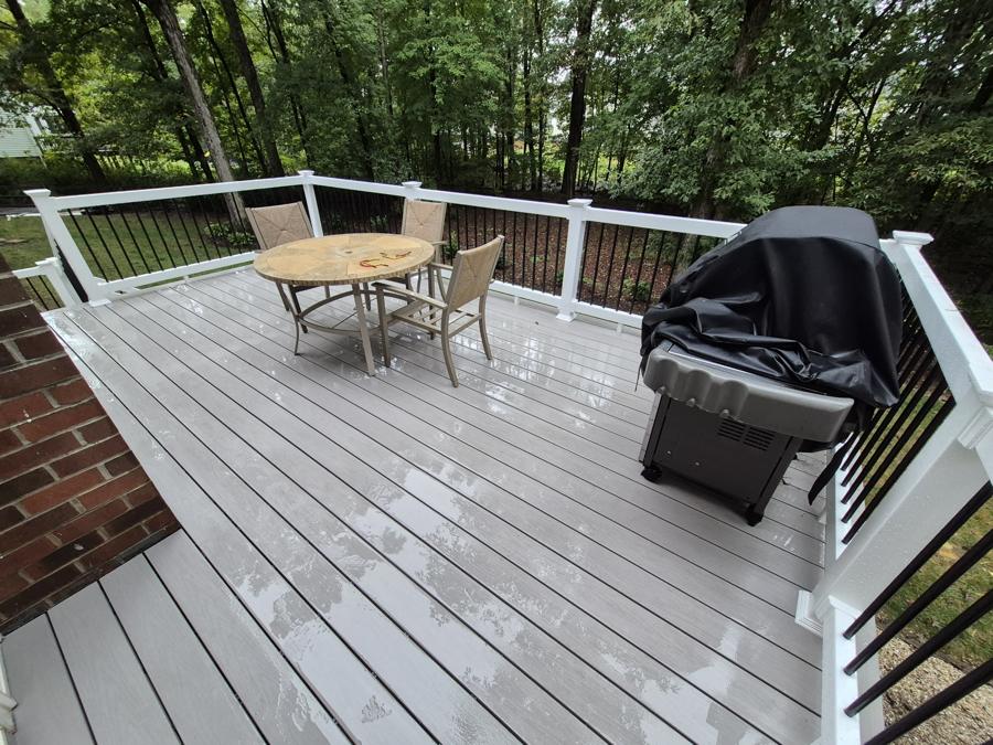 Composite deck with white PVC railing
