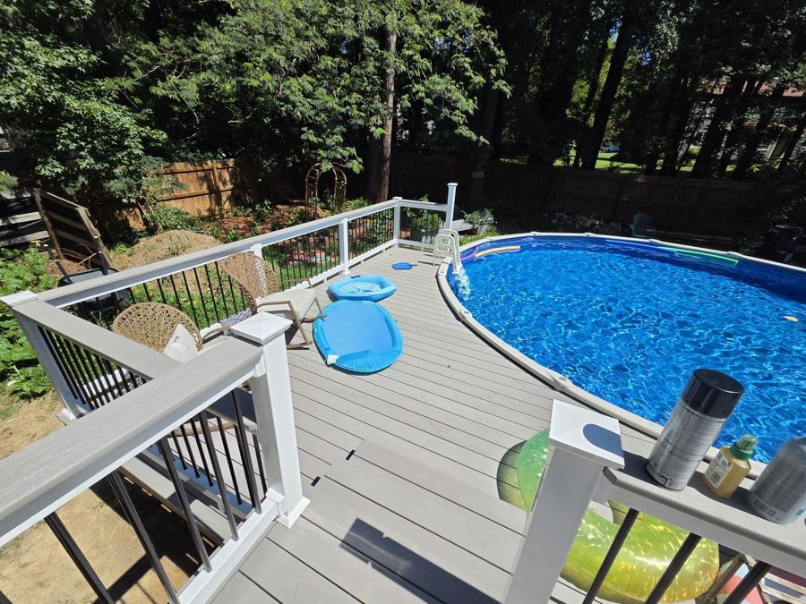 Composite pool deck with railing